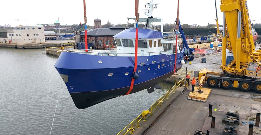 Ocean Going Boat Takes To The Skies With Crane Lift Launch Hird