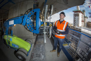 Hird glass lifting Winlet on site at Battersea Power Station with operator Danny Mills. 4 December 2015