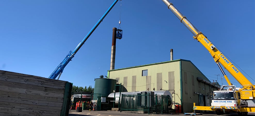 Challenging tandem lift takes down horticultural chimney stacks