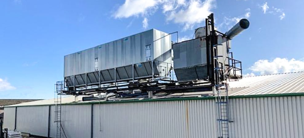 Crane lift extracts air cleaning plant at wood mill
