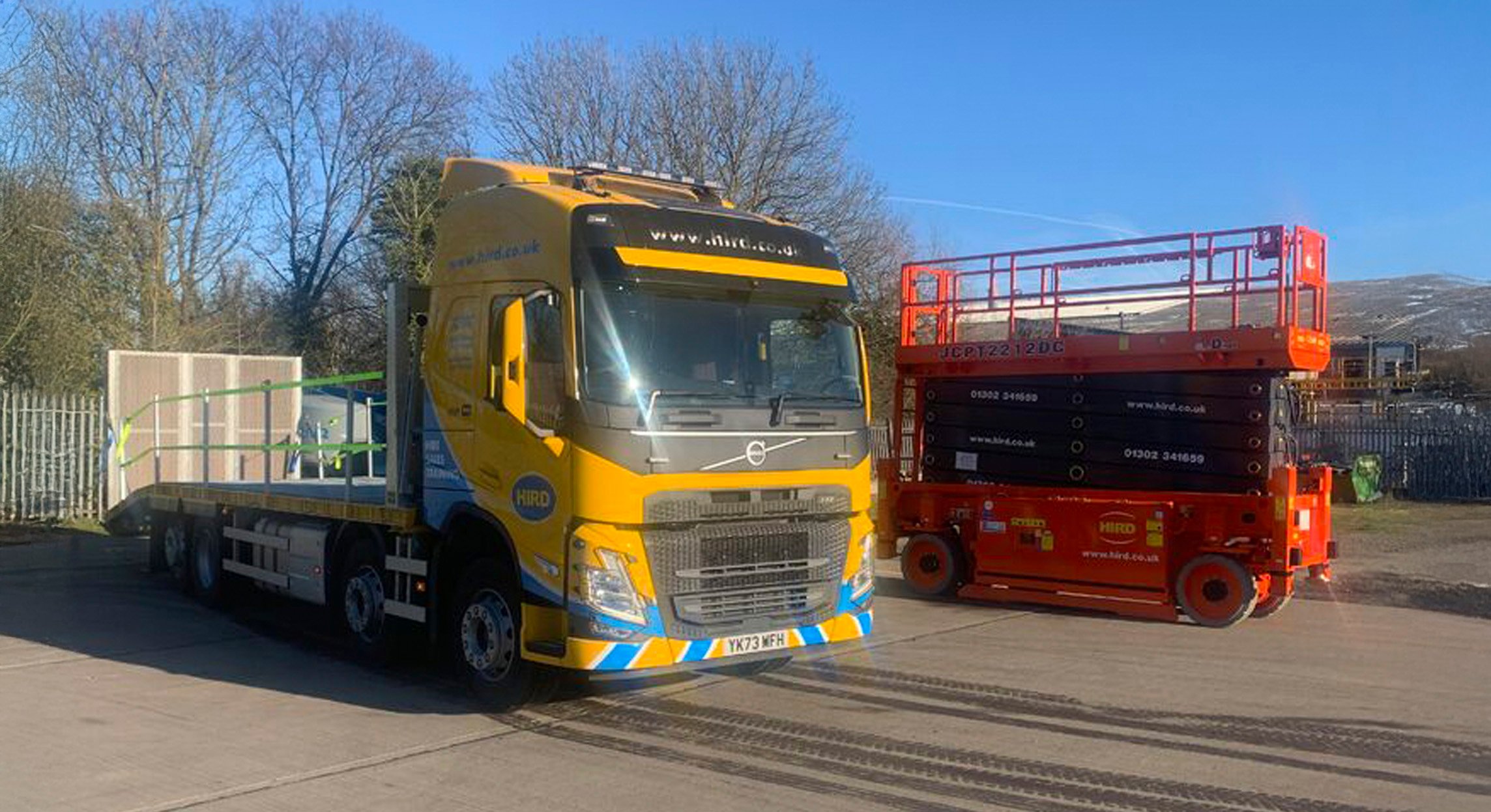 Dingli-Electric-Rough-Terrain-Scissor-Lift-waiting-to-be-loaded-onto-the-truck