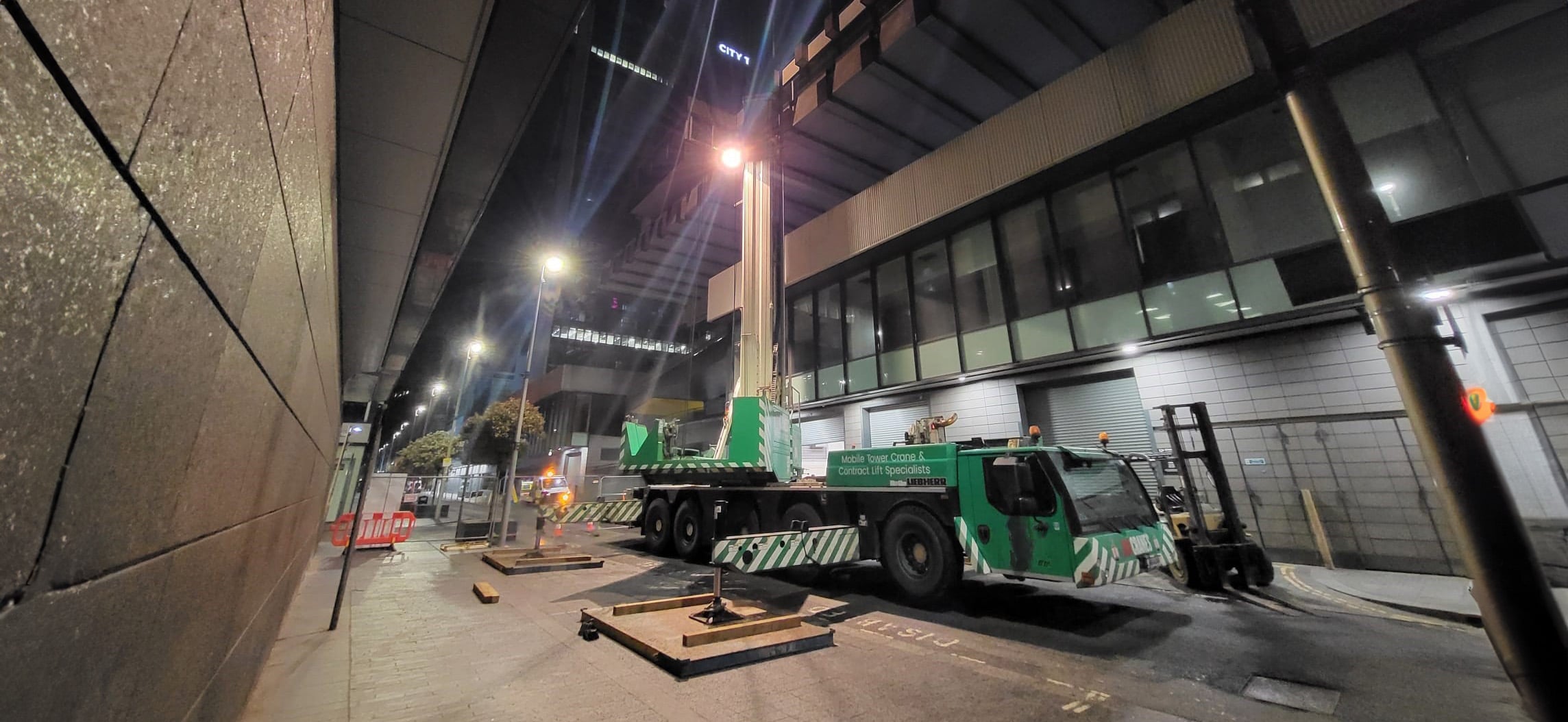 Night-time hotel crane lift a towering success for Hird team