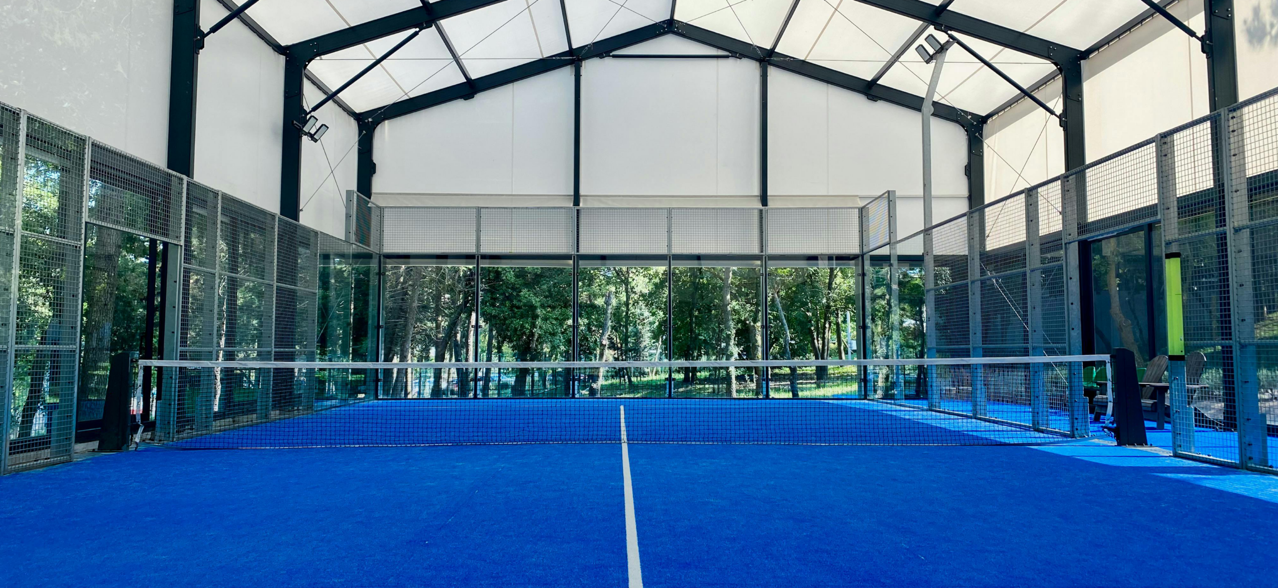 Game, Set, Glass. Why Padel Courts Up and Down the Country Need Vacuum Robots for Installation.