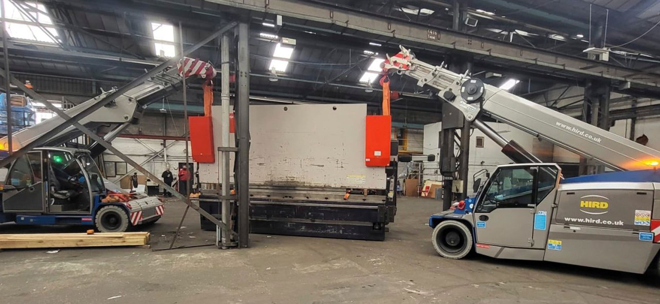 Hird pick and carry cranes pressed into service for factory lift