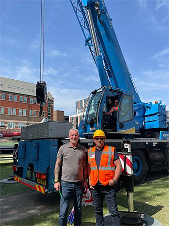 Hird Appointed Person Richie Farrar (right) with Hull 4 Heroes Chairman Paul Matson infront of the Liebherr LTM1060 3.1 mobile crane