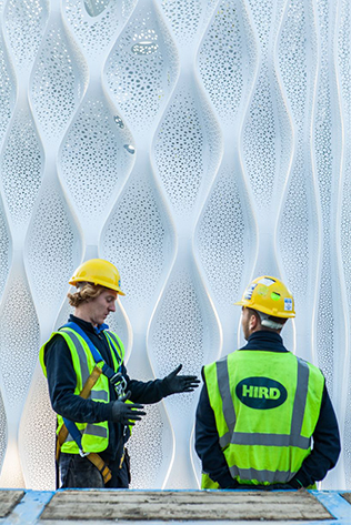 hird-lifting-team-admiring-the-solar-gate-sculpture